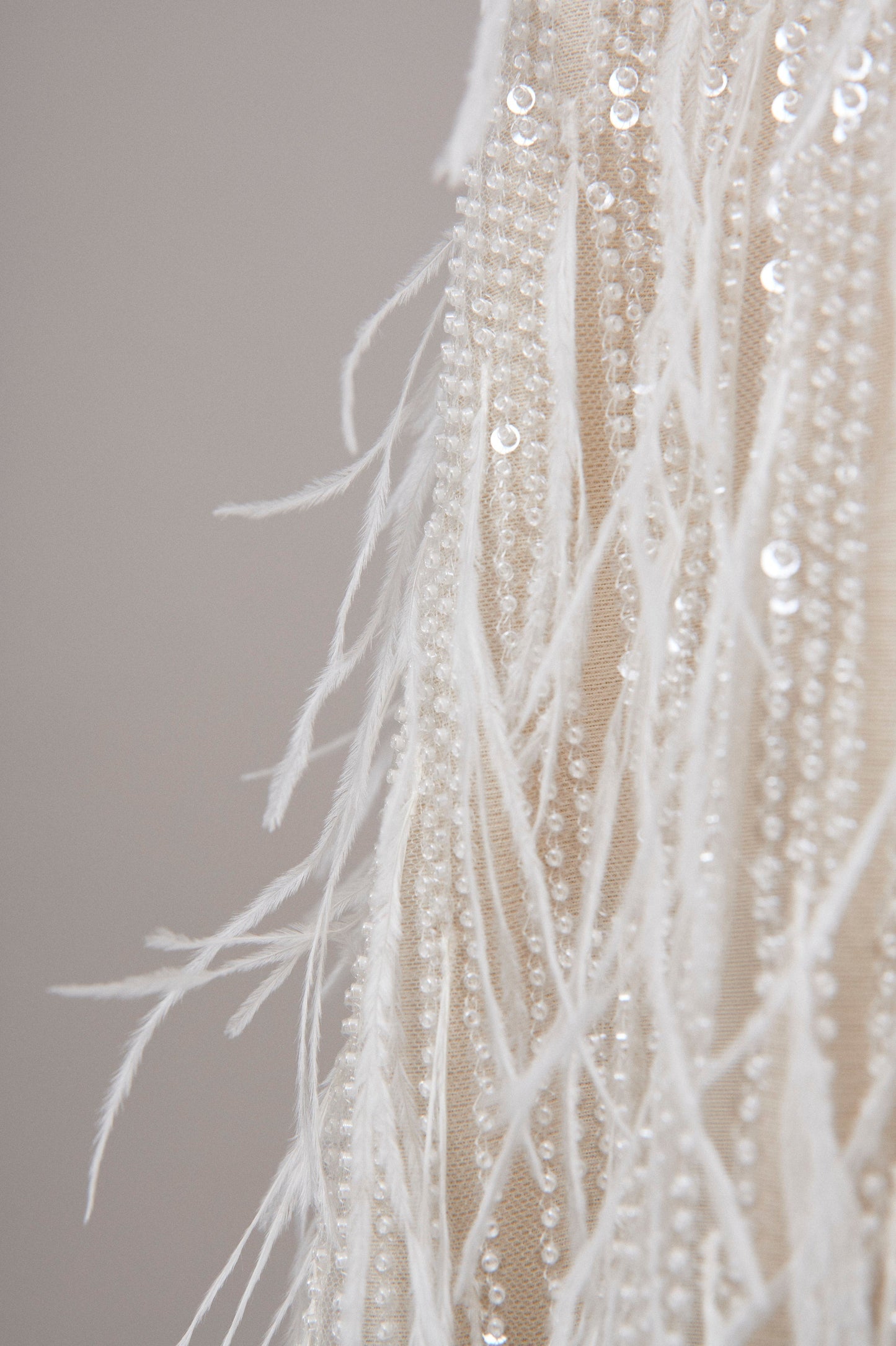 S0552 EMBROIDERY TULLE WITH SEQUINS, BEADS AND FEATHERS
