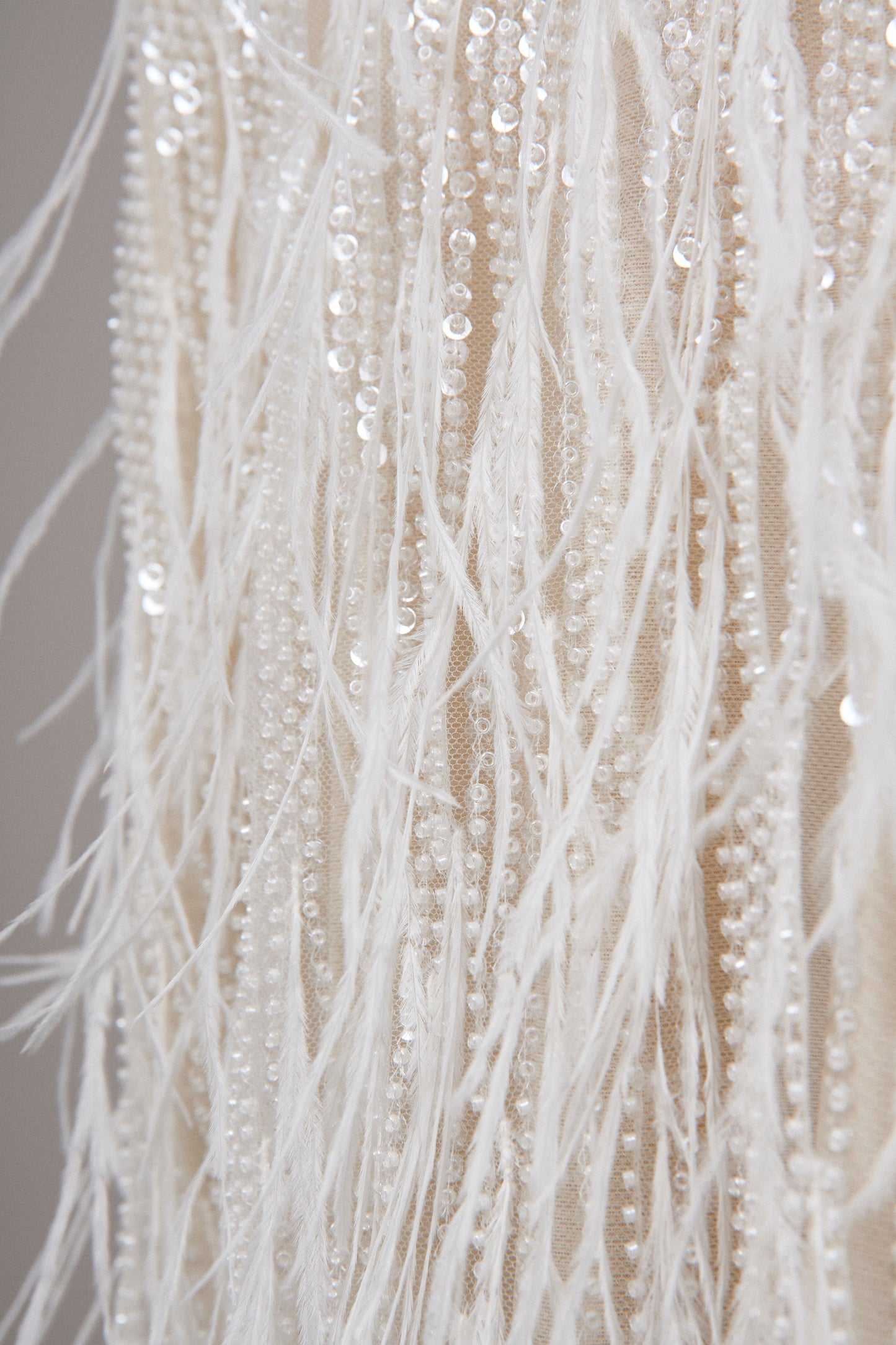 S0552 EMBROIDERY TULLE WITH SEQUINS, BEADS AND FEATHERS
