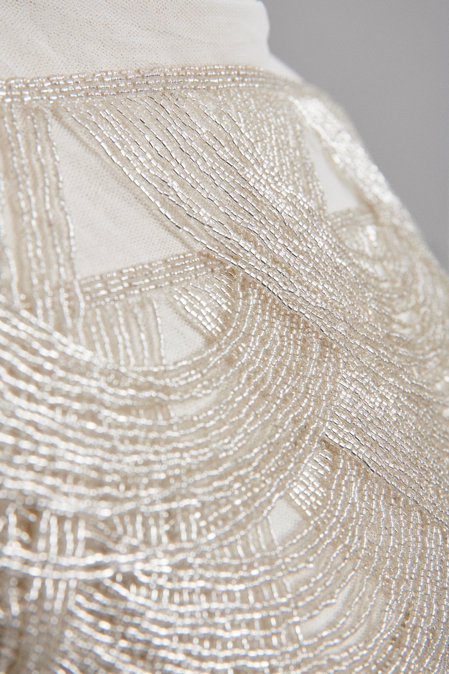 S0586 EMBROIDERY TULLE WITH OFF SILVER BEADS