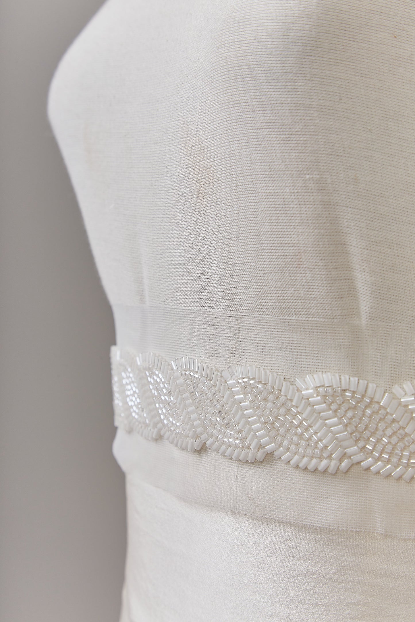 S0653 BEADED TRIM WITH OF WITHE BEADS
